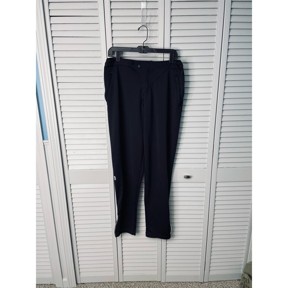 Sugoi black athletic running pants zipper pocket zipper bottom legs size medium